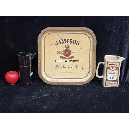 309 - Three superb pieces of pub memorabilia including a Jameson serving tray and  two vintage whiskey jug... 