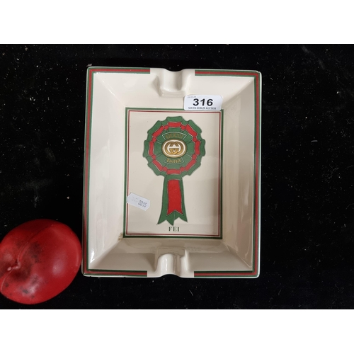 316 - A beautiful Italian made porcelain Gucci ashtray depicting the traditional Gucci colour pattern. Ful... 