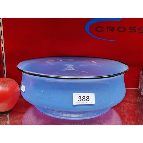 388 - A beautiful hand blown Art Deco style blue glass bowl with contrasted black rim. In very good condit... 