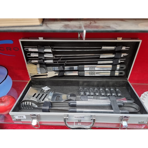 389 - A Waterford branded barbecue grill set. Complete with a grill brush, skewers, carving fork, spatula ... 