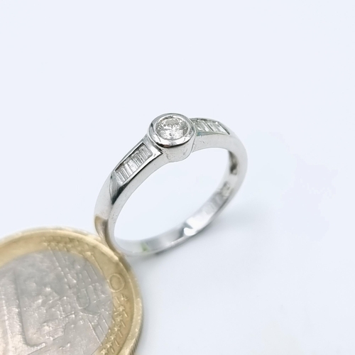 505 - Star Lot : A white gold diamond ring set, diamond stamped to band. Size - N, Weight - 2.61 grams. Lo... 