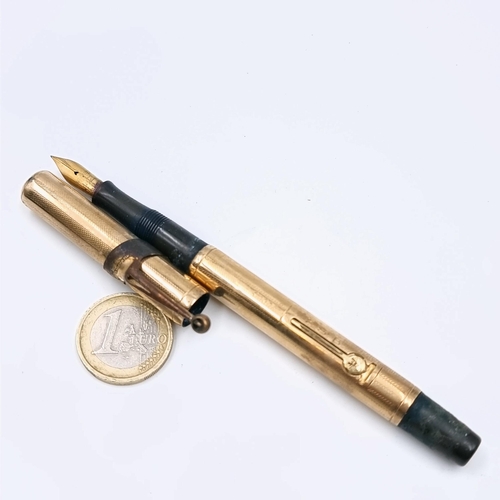 519 - Star Lot : A vintage 9ct Gold fountain pen with gold hallmarks to body. Together with a 14 carat gol... 