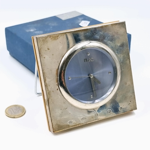 A Carrs of Sheffield sterling silver fronted travel clock.Total weight of clock is 234 grams. Packed in original box. Needs a clean.