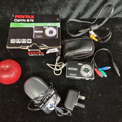 274 - A Pentax Optio E75 digital camera includes charger and travel case and original box.