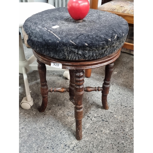 928 - A victorian 19th century piano stool, held on nicely turned mahogany legs, adjustable height with a ... 