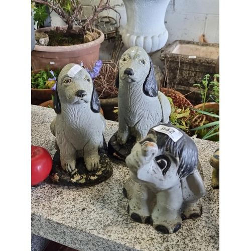 942 - A charming pair of reconstituted stone dog figurines and a stone elephant figurine. 3 lovely garden ... 