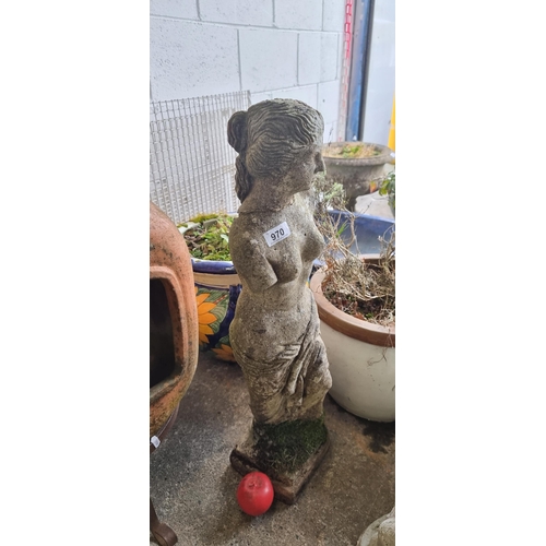 970 - An elegant garden statue, patinated granite, classical depiction, evoking a touch of antiquity for a... 