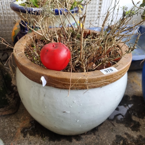 978 - A large terracotta ceramic planter with an eggshell white glaze.