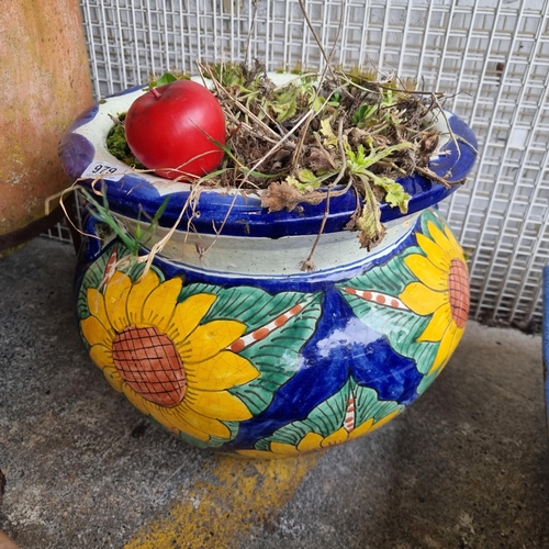 979 - A gorgeous vibrant ceramic planter showcasing a bright sunflower design with in a striking yellow an... 