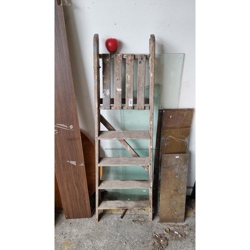 990 - A charming vintage wooden step ladder with five steps, showing authentic work-use patina.