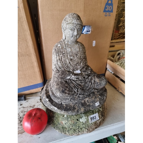 993 - A meditative antique stone garden sculpture of a Buddha, imbuing serenity and tranquility, ideal as ... 