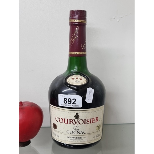 892 - A unopened and sealed 70cl bottle of Courvoisier Cognac.