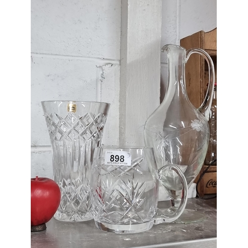 898 - Two Cavan Crystal pieces including a vase and a tankard, lot also includes an etched glass footed ju... 