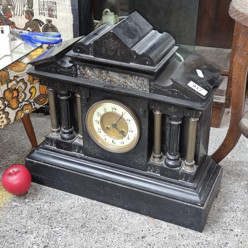 917 - Star Lot: An impressive early 20th century six pillar black slate 8 day marble mantel clock, featuri... 