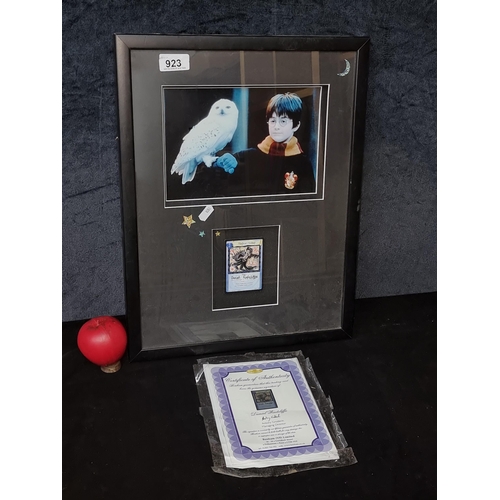 923 - Star Lot: An enchanting framed Harry Potter photograph and collectible signed card featuring the aut... 