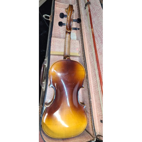 192 - A vintage violin in case with horsehair bow. Labelled Antonius Stradivarius, Cremona 1731 to interio... 