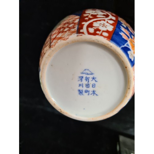 231 - A beautiful Japanese fukagawa porcelain biscuit barrel in imari patterns with silver plated rim and ... 