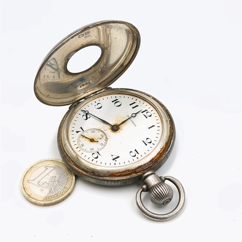 1036 - An antique English sterling silver Waltham half hunter pocket watch.