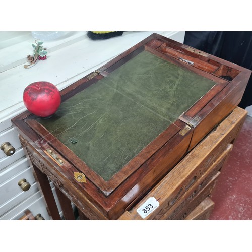 871 - Star Lot : A stunning Victorian mahogany writing slope featuring green leather interior and brass ca... 