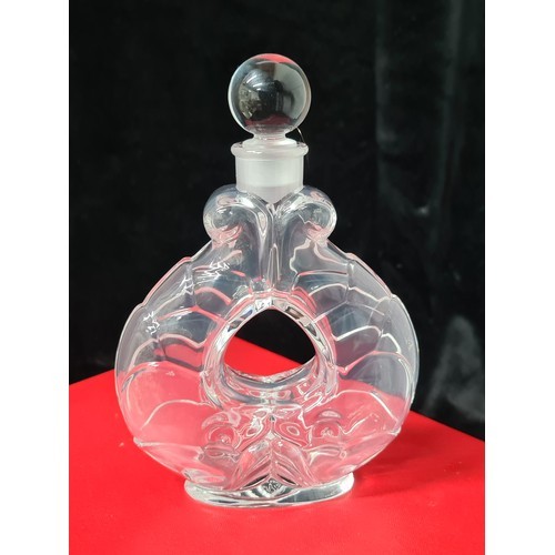 1050 - Star Lot : A stunning French Baccarat glass perfume decanter in the form of two intertwining fish. S... 