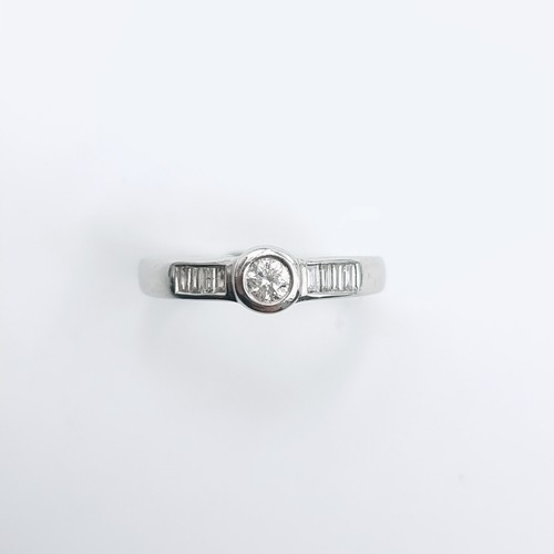 505 - Star Lot : A white gold diamond ring set, diamond stamped to band. Size - N, Weight - 2.61 grams. Lo... 