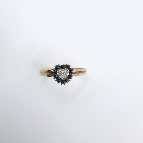 506 - Star Lot : A very pretty antique nine carat gold heart shaped ring set with sapphire and diamond clu... 