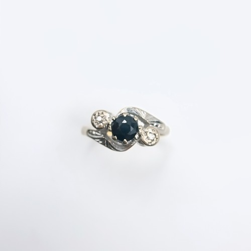 507 - Star Lot : An 18tc gold and platinum ring unmarked with sapphire and diamond ring set in twist mount... 