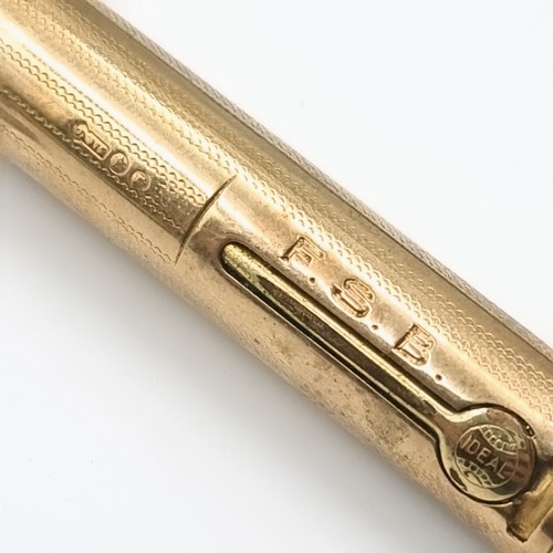 519 - Star Lot : A vintage 9ct Gold fountain pen with gold hallmarks to body. Together with a 14 carat gol... 