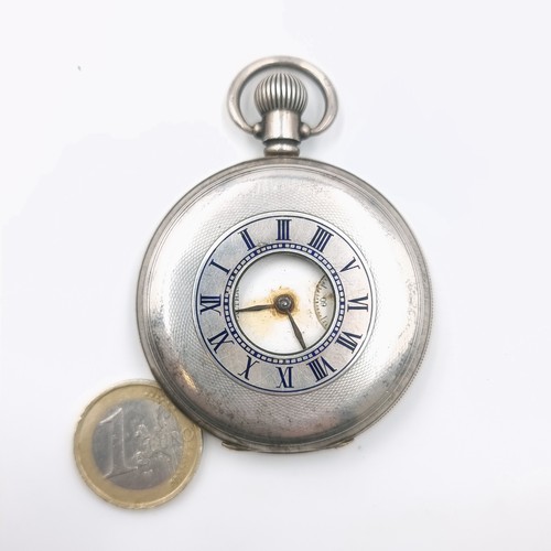 1036 - An antique English sterling silver Waltham half hunter pocket watch.