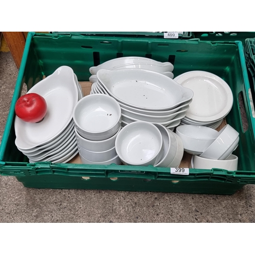 399 - A large set of ceramic dishes including twenty two Royal Gen Ware chip plates, fourteen Royal Gen Wa... 