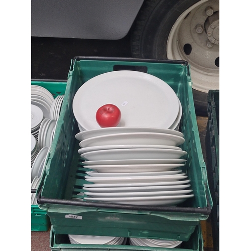 407 - A large box of commercial quality white ceramic plates by Royal Genware.