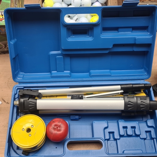 434 - A high quality Parkside laser spirit level with tripod. Complete in hard shell carrier case.