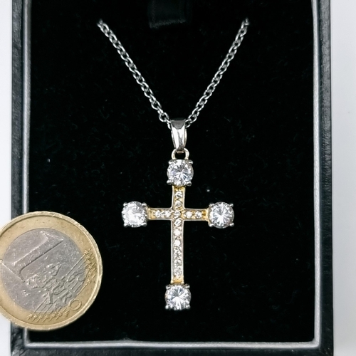 73 - An attractive sterling silver gemstone cross and chain. Length - 42 cms. Weight - 7.2 grams.