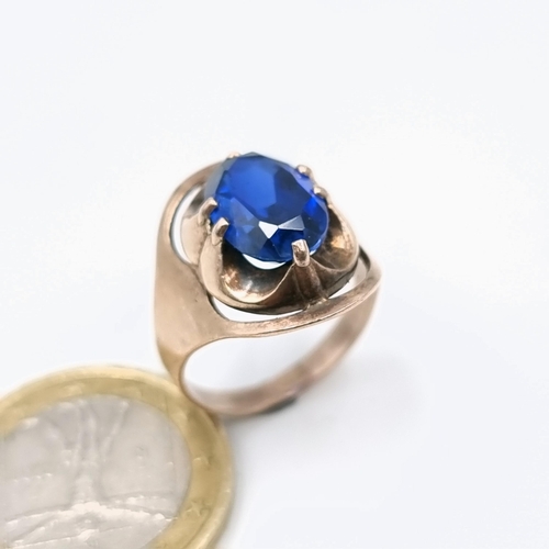 75 - A nine carat gold (375) indistinct mark. Gold blue topaz gemstone set ring. Size - M. Weight - 4.87 ... 