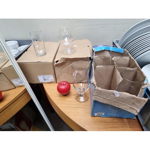 394 - 3 boxes of brand new drinking glasses including a set of 6 brandy balloon glasses and 5 beer glasses... 