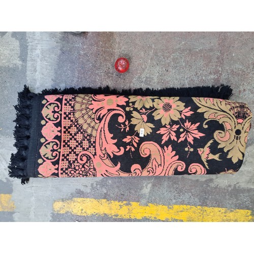 376 - An exquisite quality wool floor rug with vibrant pink and black patterns. Really lovely large rug fr... 