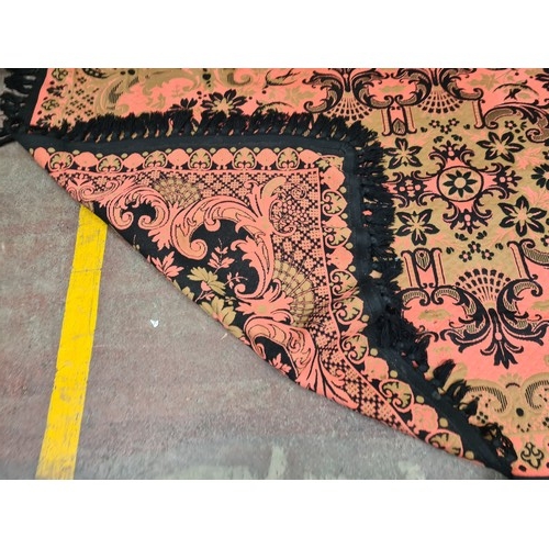 376 - An exquisite quality wool floor rug with vibrant pink and black patterns. Really lovely large rug fr... 