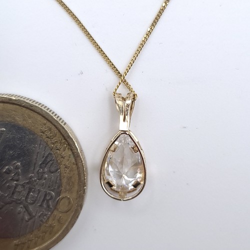 57 - A nine carat gold necklace set with a Moissanite stone ring. Total weight - 1.04 grams.