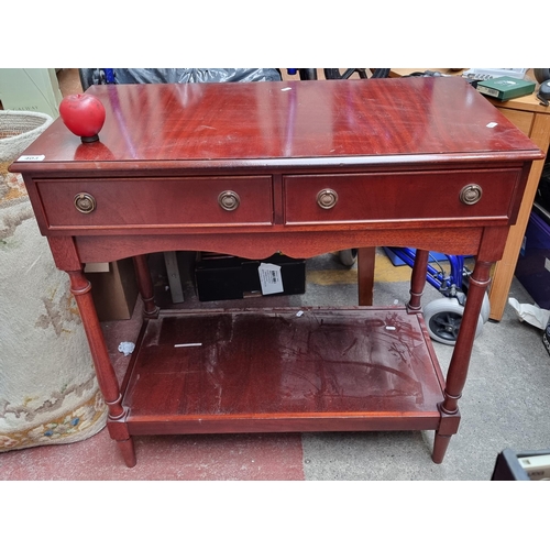 403 - A solid redwood console table with two drawers and underneath shelf in nice condition, This was the ... 