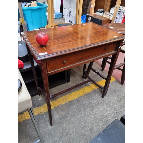 413 - A lovely vintage inlayed console table with tapering legs and one drawer. From the lovey house in Lo... 