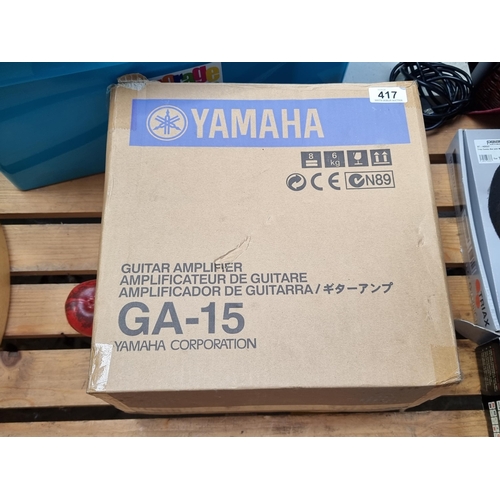 417 - A brand  new in the box Yamaha TG121 amplifier.