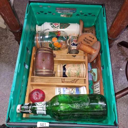 581 - A selection of vintage items including a large Grolsch larger display bottle, a wall mounted bottle ... 