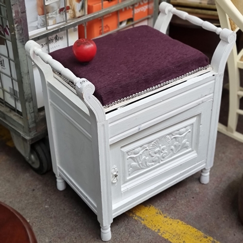 593 - A charming hall stool opening to reveal under storage and an additional cupboard beneath, finished i... 