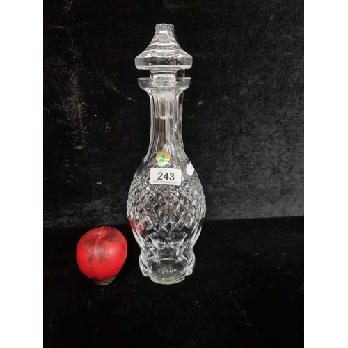 243 - A handsome Waterford Crystal decanter in the Colleen pattern. In  very good condition with original ... 