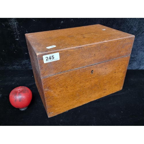 245 - A sturdy Victorian oak cased box with L. R. Lever brass catch. Features wonderful dove tail joinery.