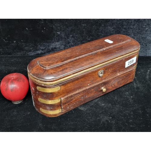 259 - A handsome Victorian wooden brass bound stationary box.