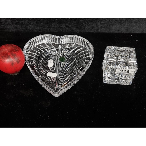 316 - An exquisite duo of Waterford Crystal items including a heart shaped dish and a heavy cube paperweig... 