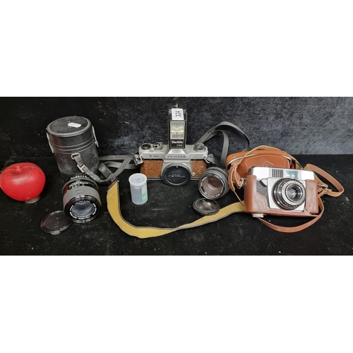 324 - A great collection of camera equipment including an Asahi Pentax K1000 film camera, a Silette Rapid ... 