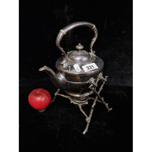 331 - A gorgeous silver plated spirit kettle with burner stand.