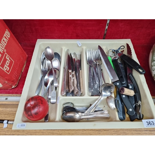 363 - A drawer full of vintage and contemporary cutlery and other kitchen utensils a d chef knifes.